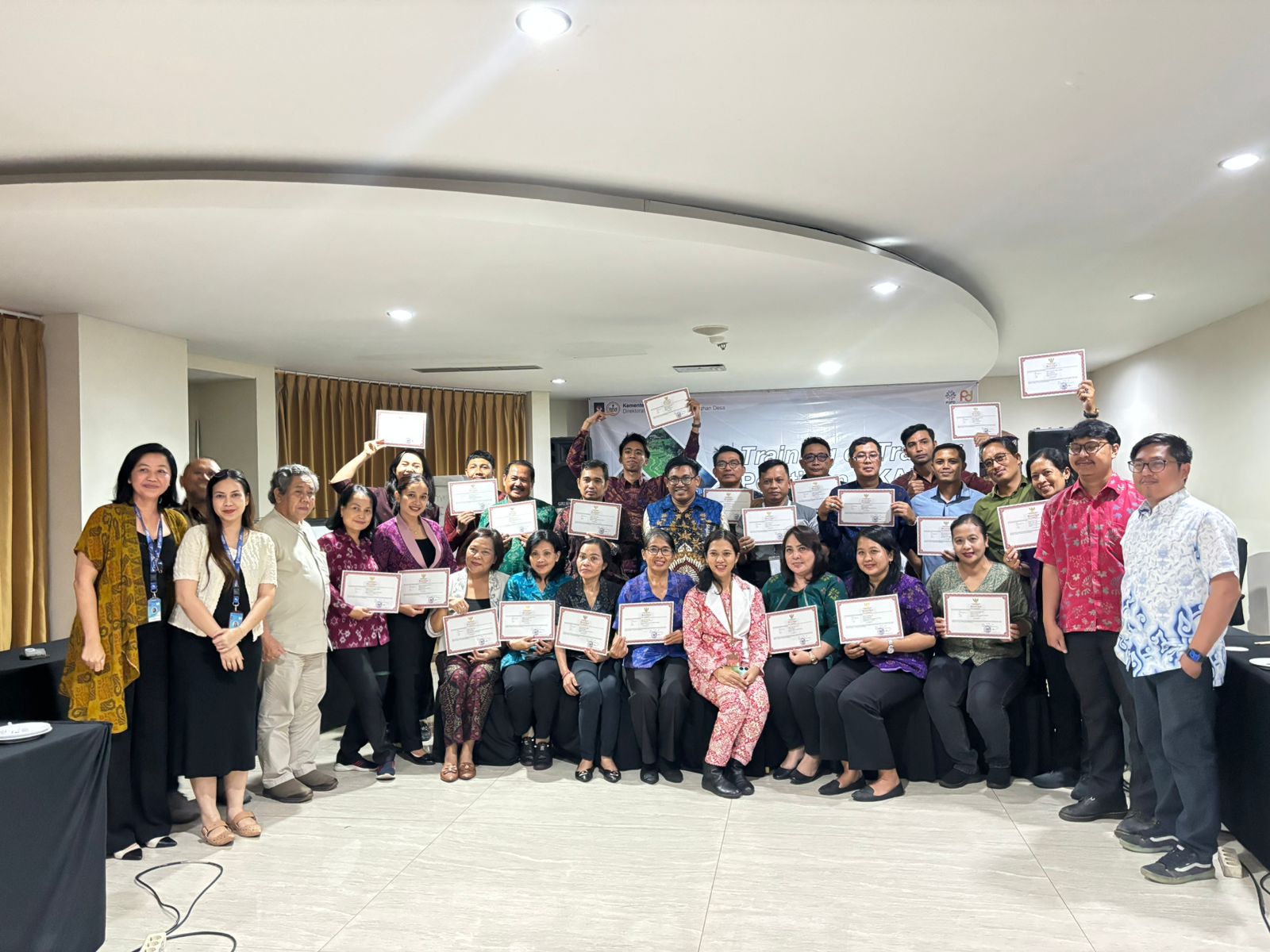 Modern city skyline at night with illuminated skyscrapers and light trails from traffic